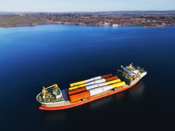 istock Ship Carries Wind Turbine Towers 2191322655