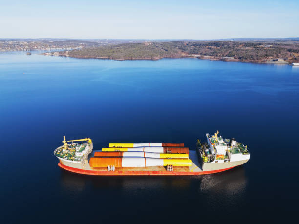 istock Ship Carries Wind Turbine Towers 2191322657
