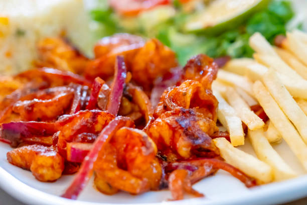 Shrimps a la diabla with garnish
