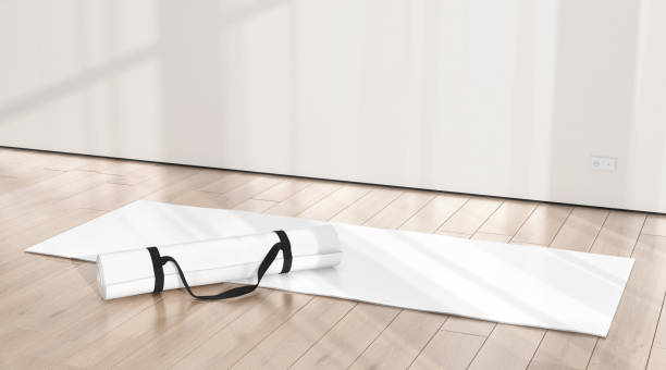 istock Blank white rolled unfolded yoga mat in sport area mockup 2191324877
