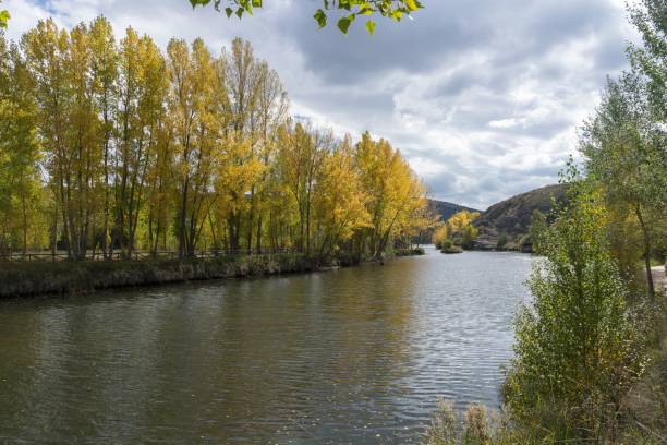 istock Autumn landscape with the Duero river passing through Soria 2191325737