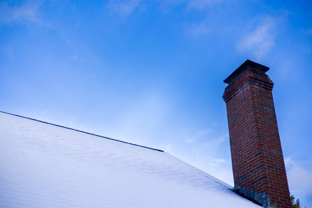 istock Snowy Roof with Brick Chimney 2191332472