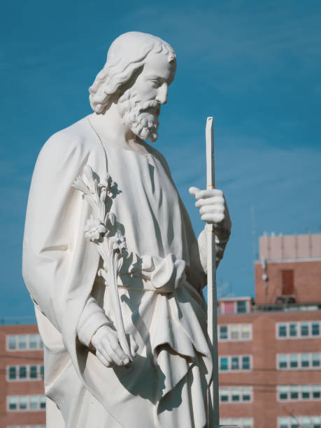 istock Saint Joseph Statue in Urban Outdoor Setting 2191333114