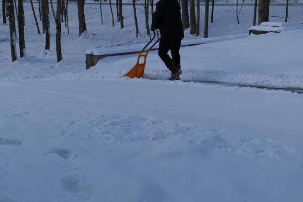 istock Winter Scene Snow Removal Shoveling Snow Snow Storm 2191335748
