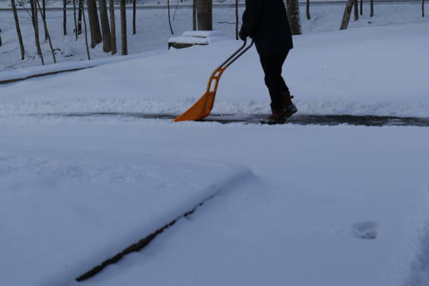 istock Winter Scene Snow Removal Shoveling Snow Snow Storm 2191335855
