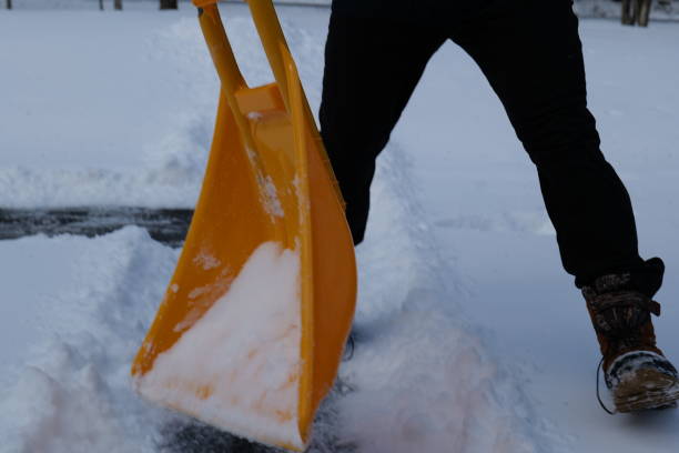 istock Winter Scene Snow Removal Shoveling Snow Snow Storm 2191335857