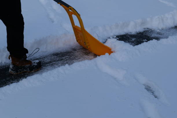 istock Winter Scene Snow Removal Shoveling Snow Snow Storm 2191335955