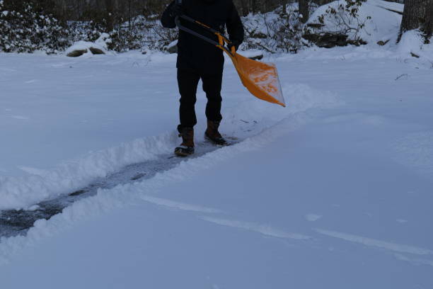 istock Winter Scene Snow Removal Shoveling Snow Snow Storm 2191335964