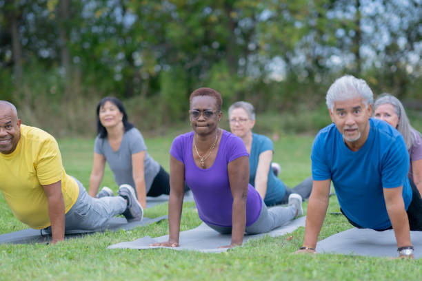 istock Outdoor Adult Yoga Class 2191336342