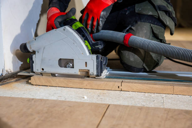 istock Carpenter Using Circular Saw with Dust Extraction Indoors 2191342489
