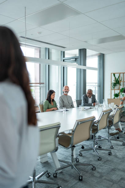 istock Diverse Team Engages in Project Discussion in Modern Office 2191343148