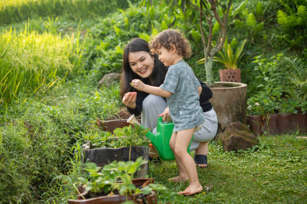 istock Mother Gardening With Her Son 2191344045