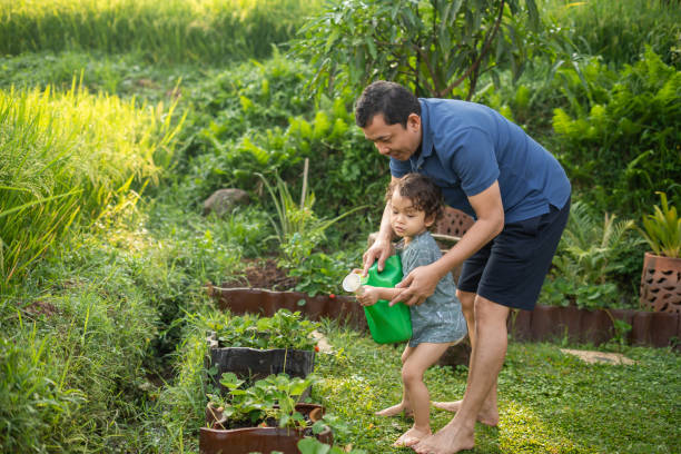 istock Father Gardening With His Son 2191344052