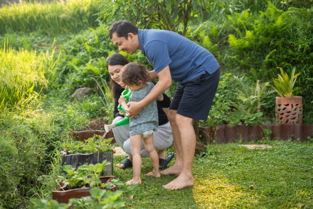 istock Father Gardening With His Son 2191344079