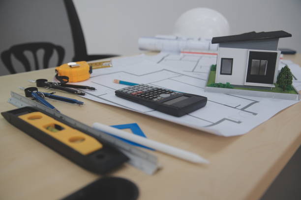 istock Architects, engineers, contractors working in the office with blueprints, inspection engineers Work analysis for architectural plan, construction project sketch, focus, business construction concept. 2191344650