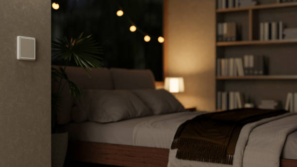 A cozy, contemporary bedroom at night featuring a comfortable bed and sleek home decor.