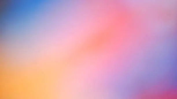Photo of Gradient Harmony. Smooth blues blend into soft pinks and oranges, creating a tranquil and balanced transition of colors.