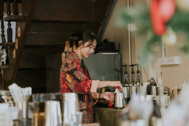 istock Barista female measuring sugar for making syrup 2191359292