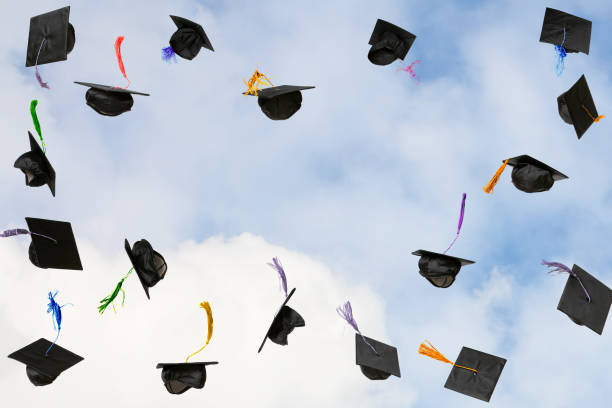 istock Graduation caps thrown in the sky 2191361649