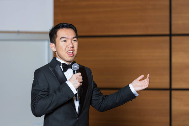 istock Young man giving a speech as the emcee of an event 2191367840