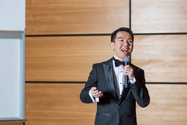 istock Young man giving a speech as the emcee of an event 2191367844