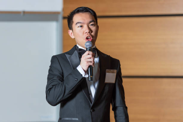 istock Young man giving a speech as the emcee of an event 2191367896