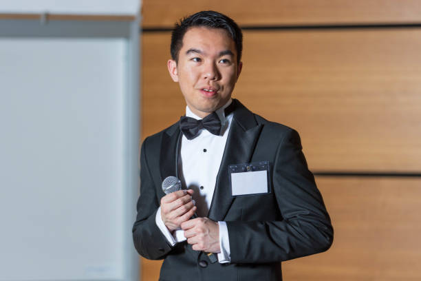 istock A young man walking on stage confidently as the emcee 2191367974