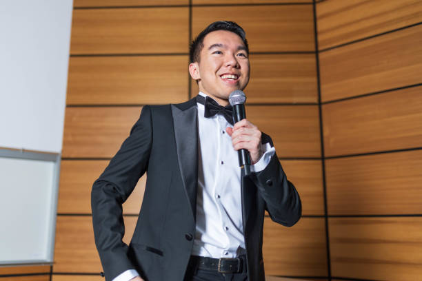 istock Young man giving a speech as the emcee of an event 2191368364