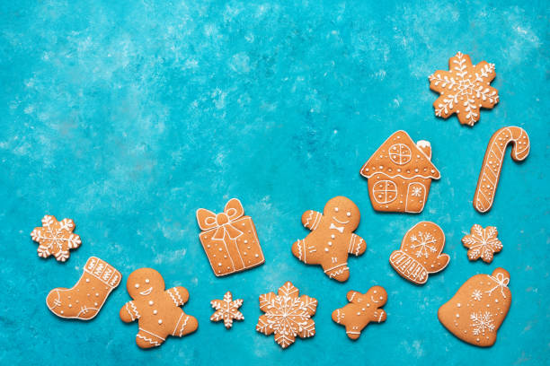 istock Various christmas gingerbread cookies on blue rustic background, corner frame, copy space, top view, flat lay 2191369209