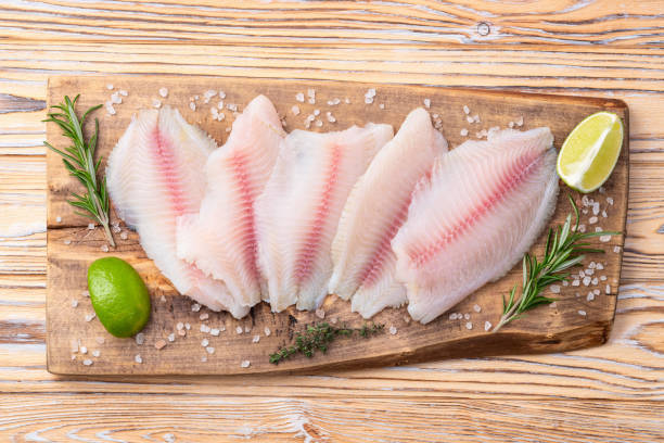 istock Raw tilapia fillet photography . Top view 2191373361