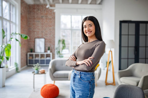 istock Happy woman in modern space with chic interior design 2191373971