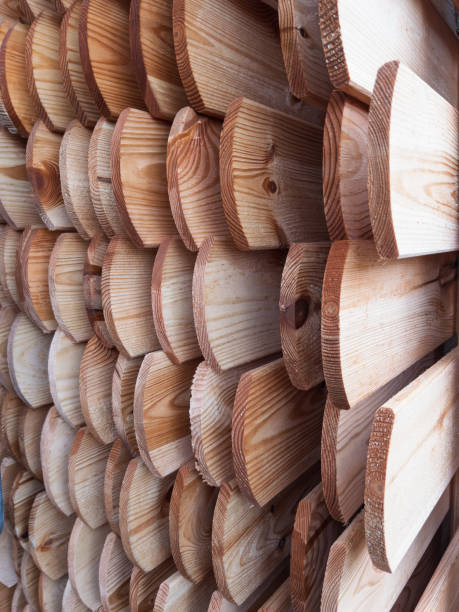 istock Wooden Planks Stacked Neatly for Construction and Design 2191379388