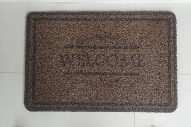 istock Welcome Doormat Close Up and Isolated Mat View 2191380244