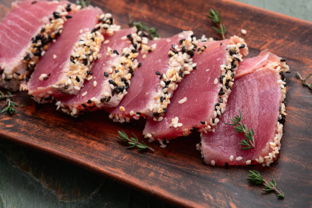 istock Sliced tuna steak with sesame photography . Top view 2191380387