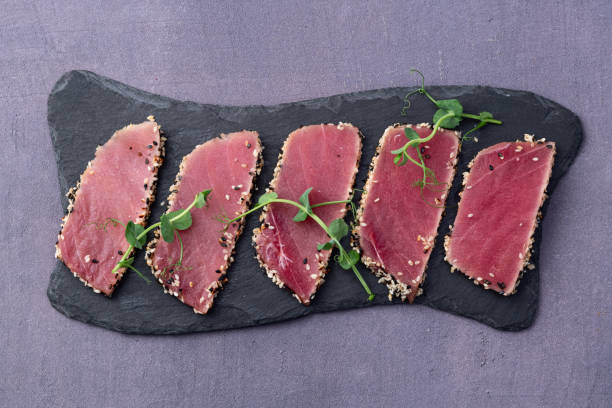 istock Sliced tuna steak with sesame photography . Top view 2191380391