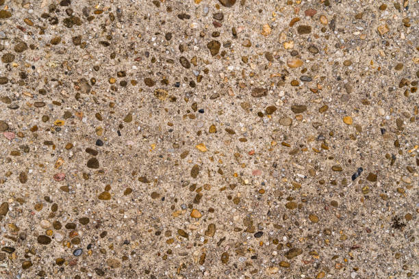 istock Concrete texture with fine gravel in old concrete as background. 2191385422