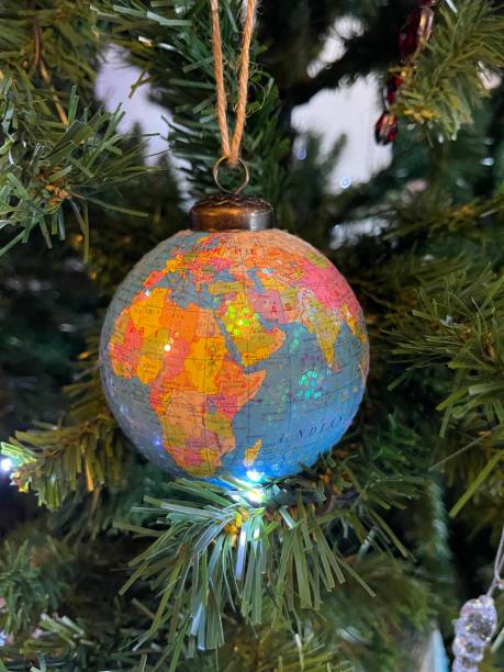 istock Globe bauble on tree with Africa, Europe, Central Asia and Gulf 2191387006