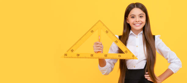 istock angle degree measurement. trigonometry stationery. measuring and sizing. Horizontal isolated poster of school girl student. Banner header portrait of schoolgirl copy space. 2191389756