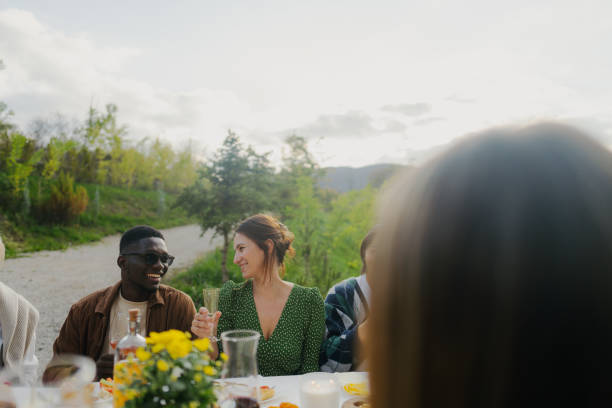istock An outdoors dinner party with friends 2191391455