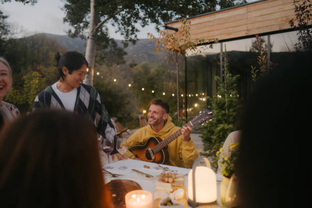 istock Guitar, wine and good friends 2191391485