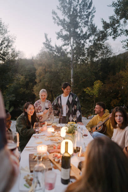 istock Guitar, wine and good friends 2191391495