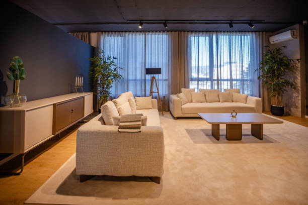 istock Bright living room with large windows and careful decor 2191391575