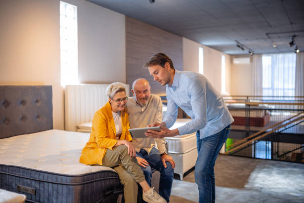 Customers reviewing product options with advisor