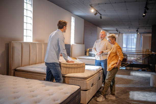 istock Considering different mattress styles in a showroom. 2191392145