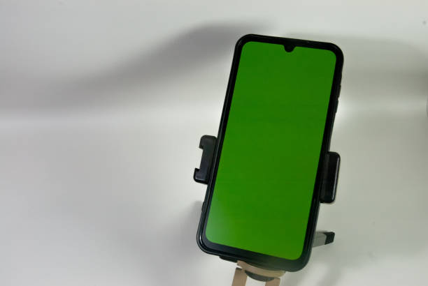 istock cellphone holder stand with green screen and white background 2191392196