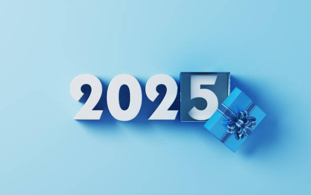istock White New Year 2025 Text and Patterned Gift Box on Soft Blue Background 2191393514