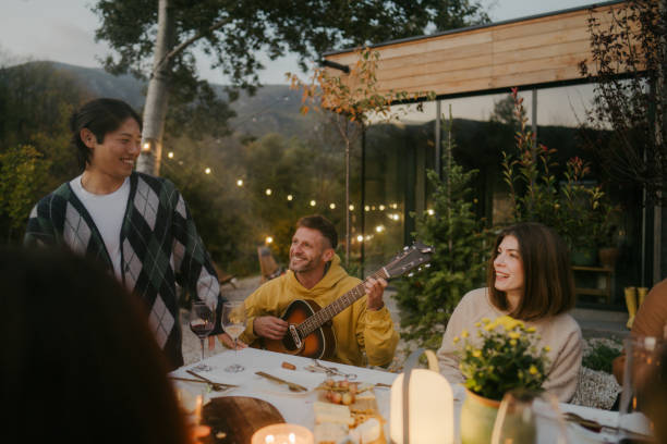 istock Guitar, wine and good friends 2191394149
