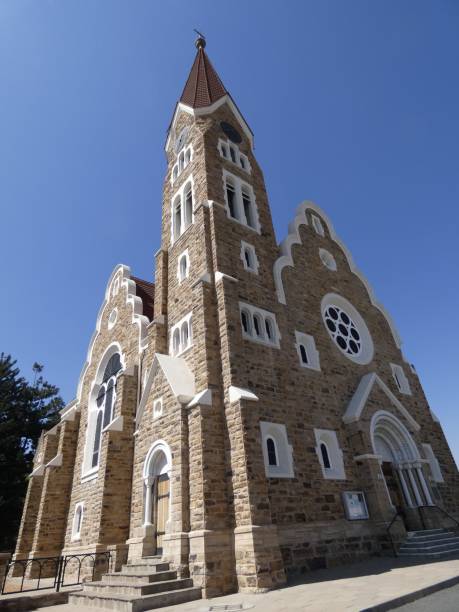 istock Historic stone church with Gothic architecture under blue sky. 2191394172