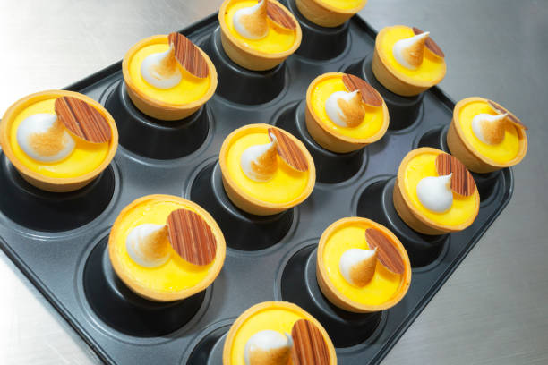 istock Fresh creme tarts on black plate 2191395123