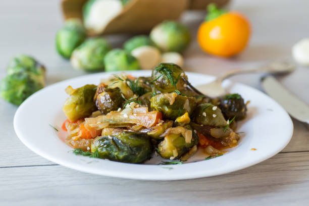 istock Brussel sprouts cooked with vegetables and spices 2191395143